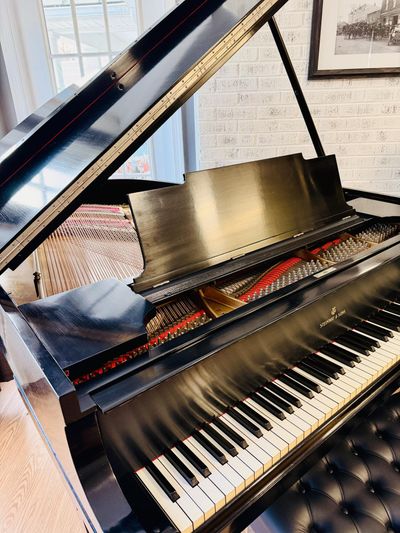 Piano being prepared for sale
